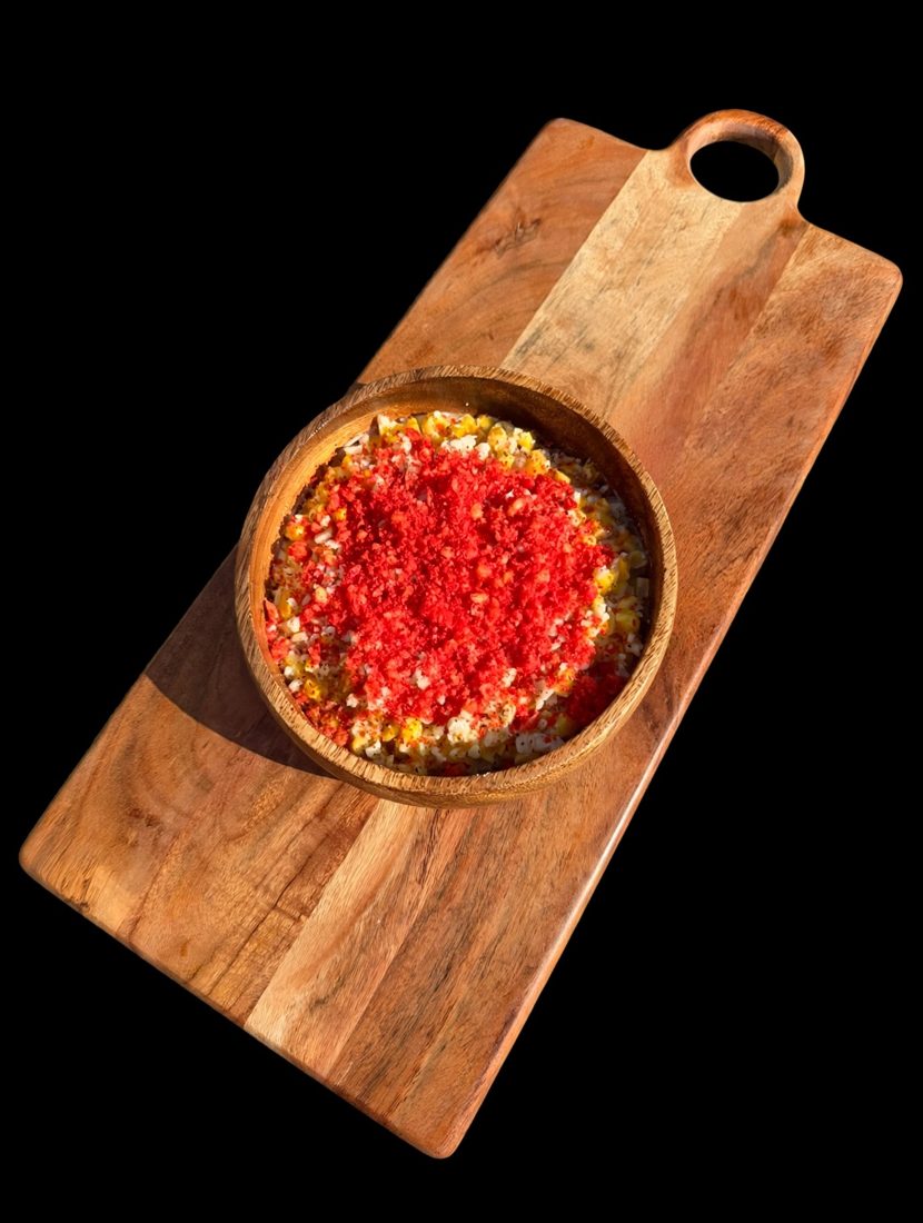 Elote topped with crushed Flamin' Hot Cheetos